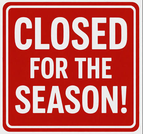 Virgin Islands off season — 'Closed for the season' sign, marking what closes across the USVI and BVI August through November