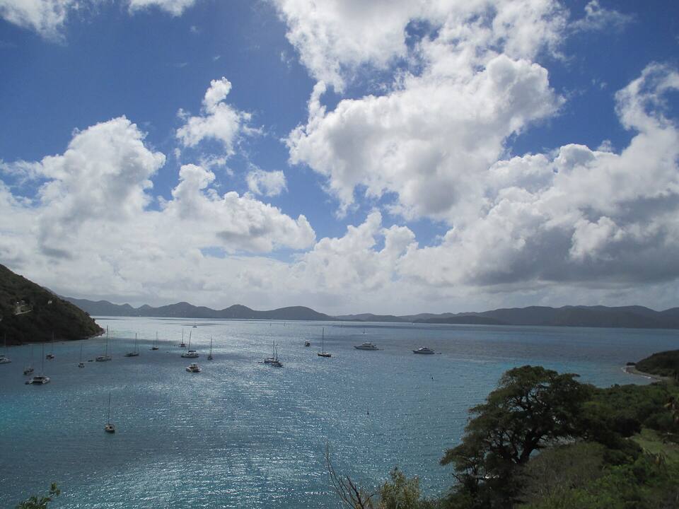 Great Harbour, Jost Van Dyke, from the hill: boats at anchor in the bay and the islands to the south on the horizon