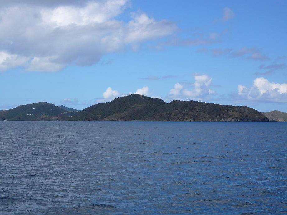 Scrub Island's dry hills seen from the sea
