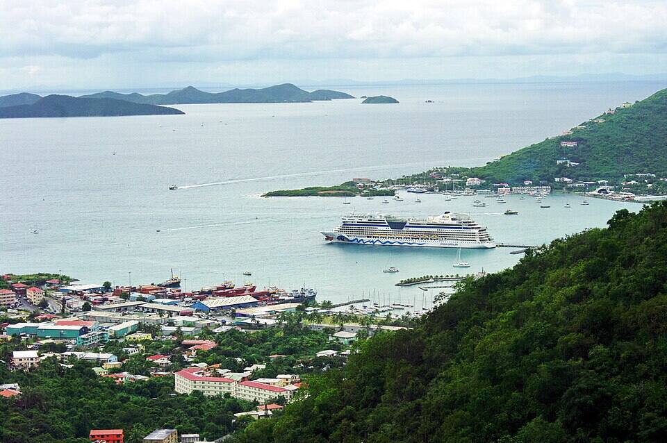 Road Town and Road Harbour from the hills, a cruise ship in the harbour and the Sir Francis Drake Channel beyond