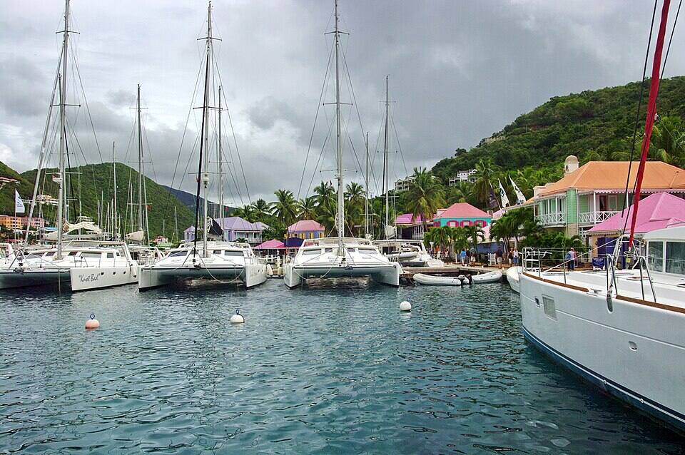 Soper's Hole at the West End: yachts on the moorings and the painted wharf-side buildings
