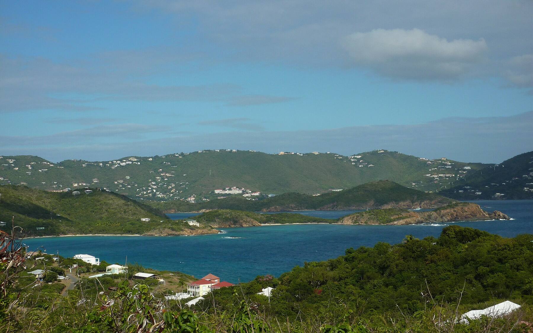 Water Island's hills and bays seen from Fort Segarra, with St. Thomas across the water behind